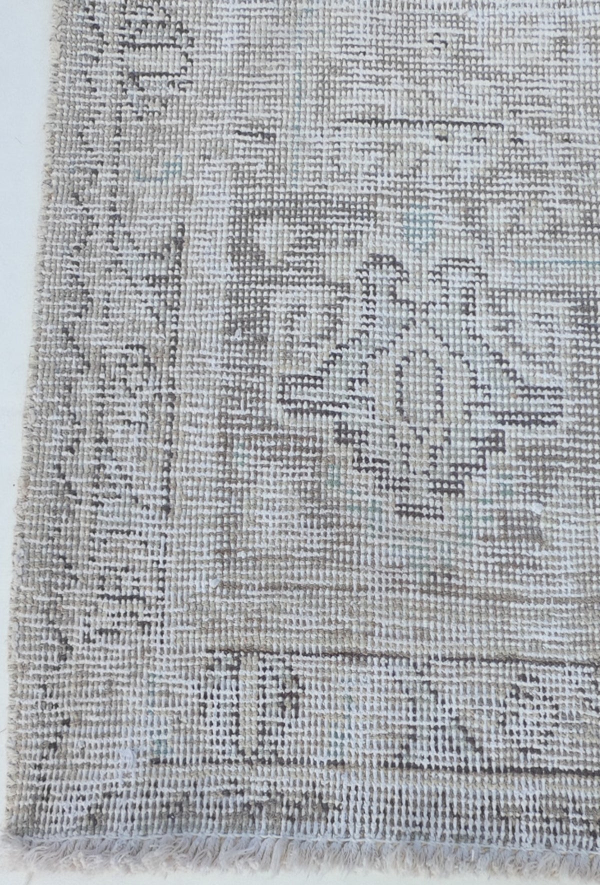 Textura detallada de lana en alfombra vintage importada