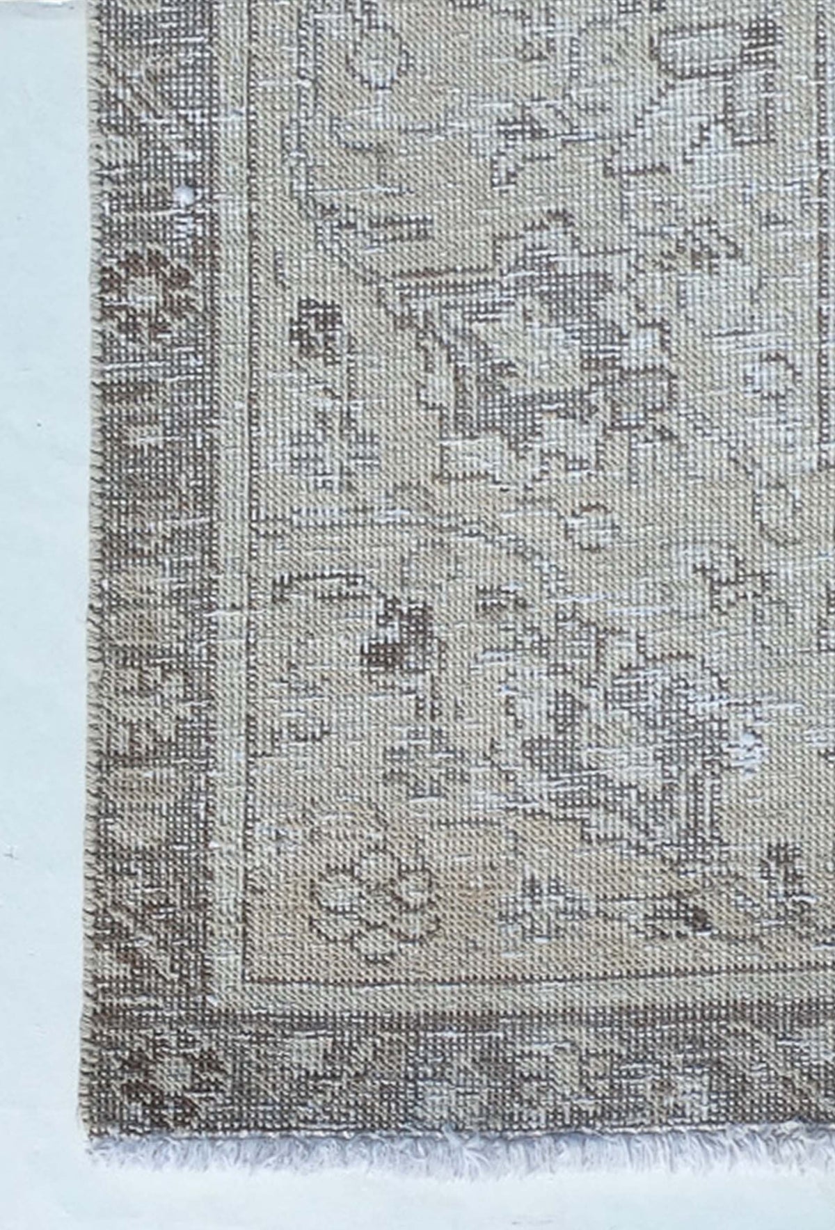 Textura de lana natural en alfombra vintage importada, tacto suave
