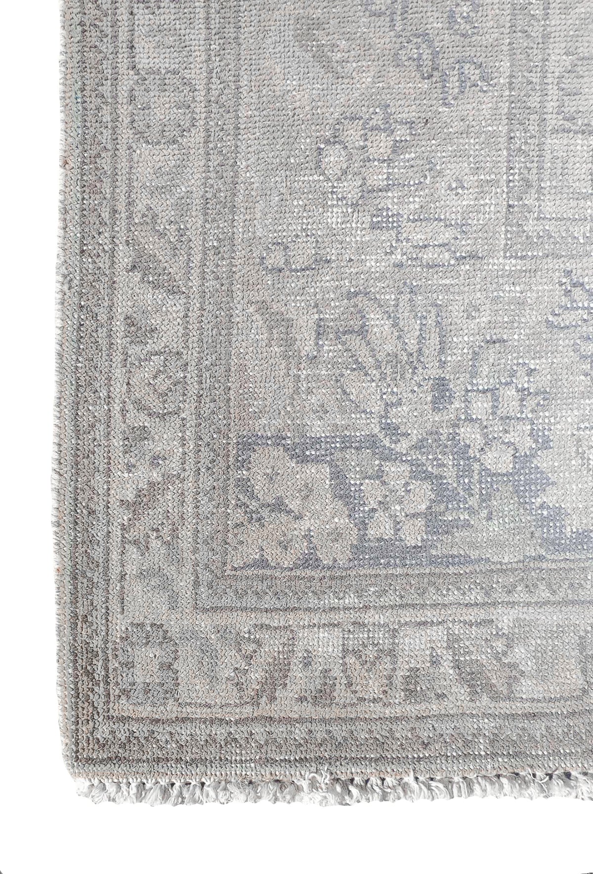 Detalle del tejido de la alfombra persa vintage