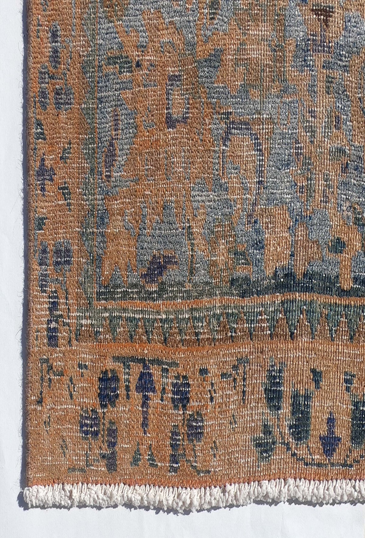 Textura detallada de lana en alfombra persa vintage importada