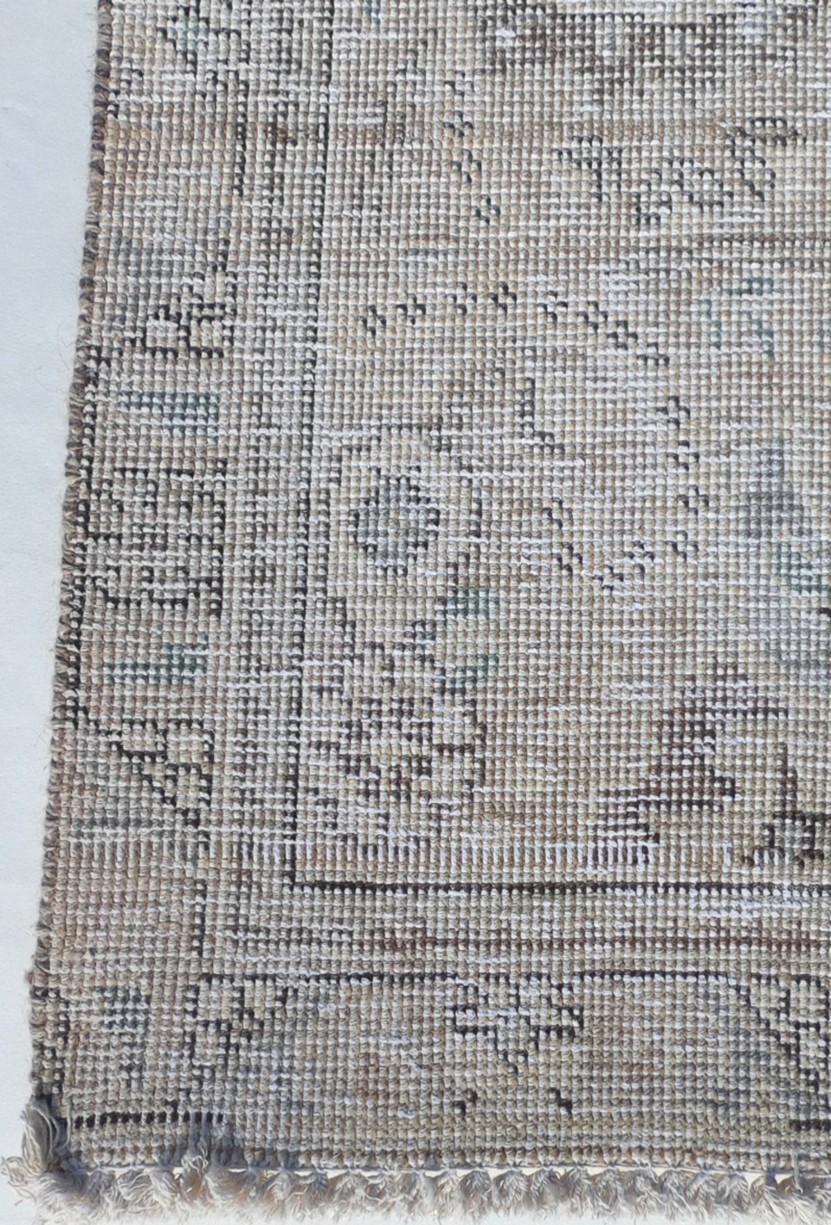 Textura de lana natural en alfombra persa turca hecha a mano