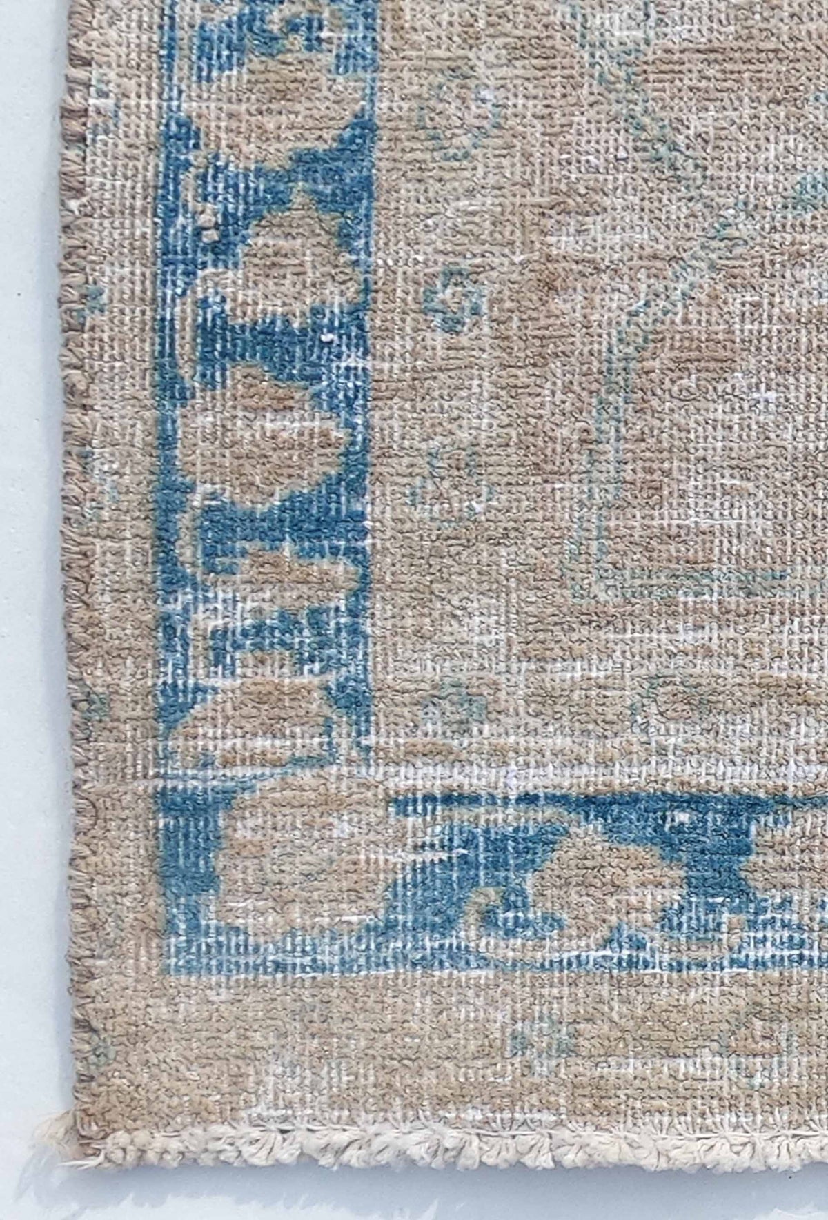 Textura de lana natural en alfombra vintage importada, aspecto suave