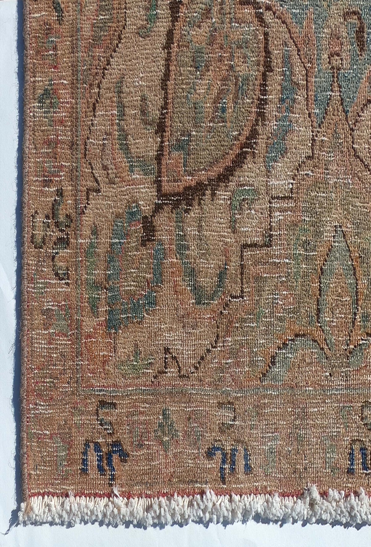 Textura detallada de lana en alfombra persa vintage hecha a mano