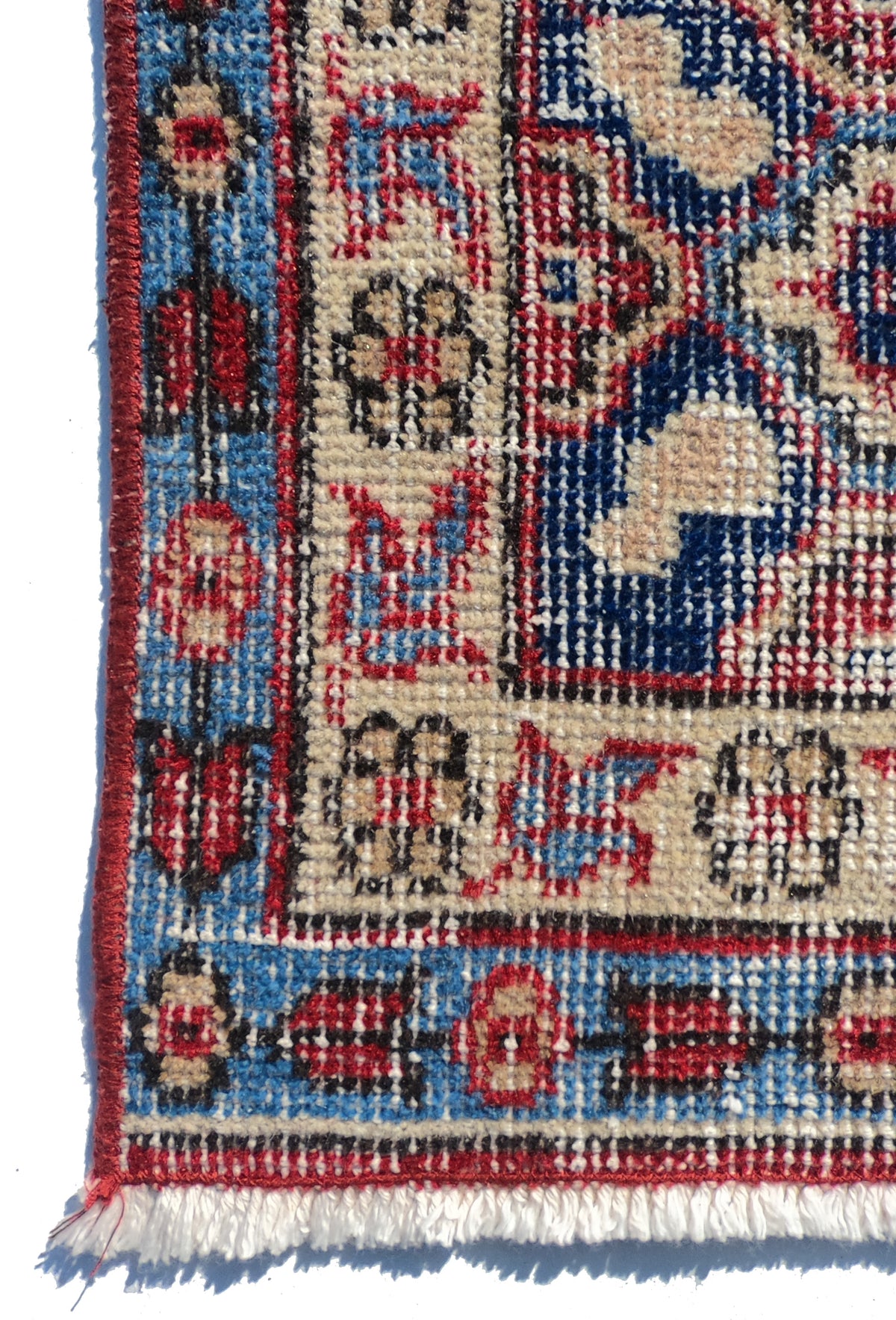 Textura natural de la lana en alfombra persa vintage hecha a mano
