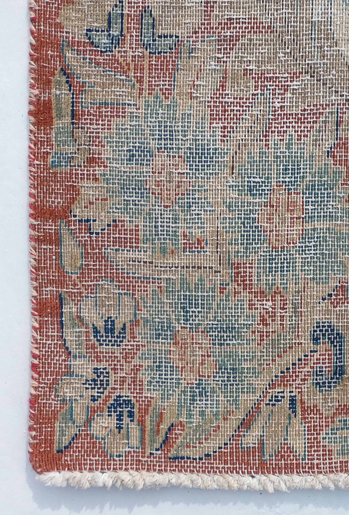 Textura de lana natural en alfombra persa hecha a mano, aspecto vintage