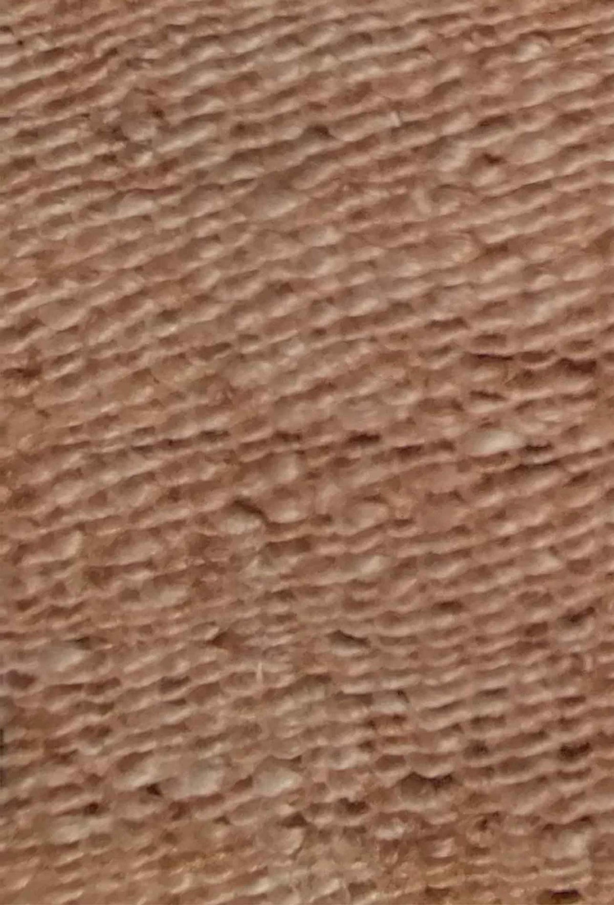 Detalle del tejido artesanal en alfombra de yute natural estilo Agra