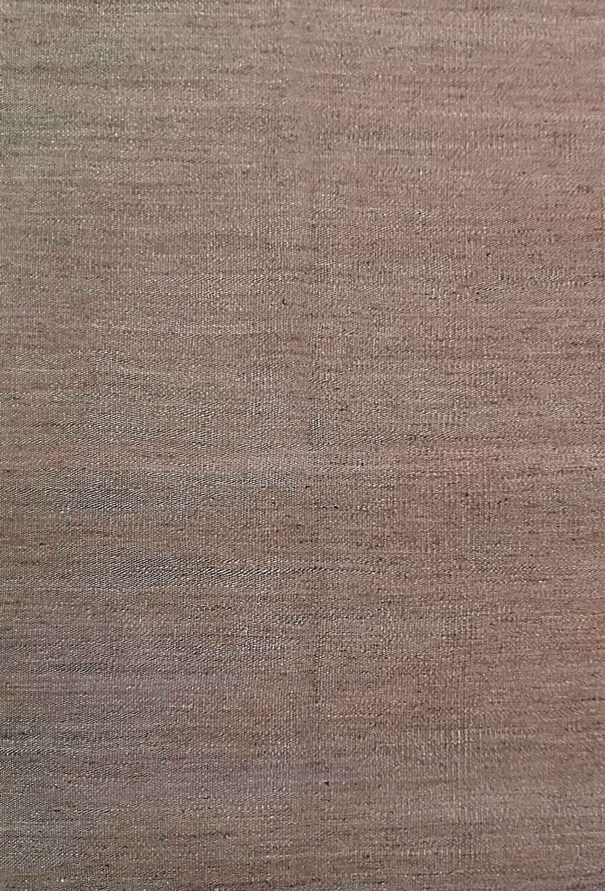 Detalle del tejido en telar de alfombra sisal india, estilo natural