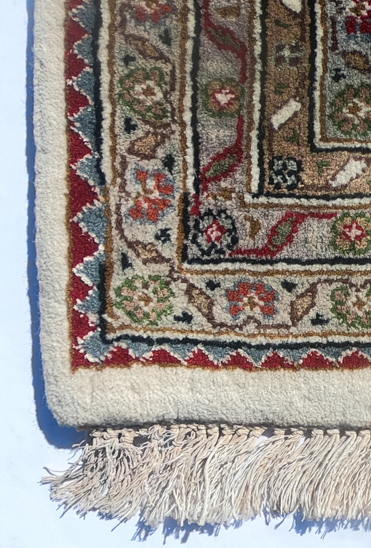 Textura de lana natural en alfombra persa vintage hecha a mano